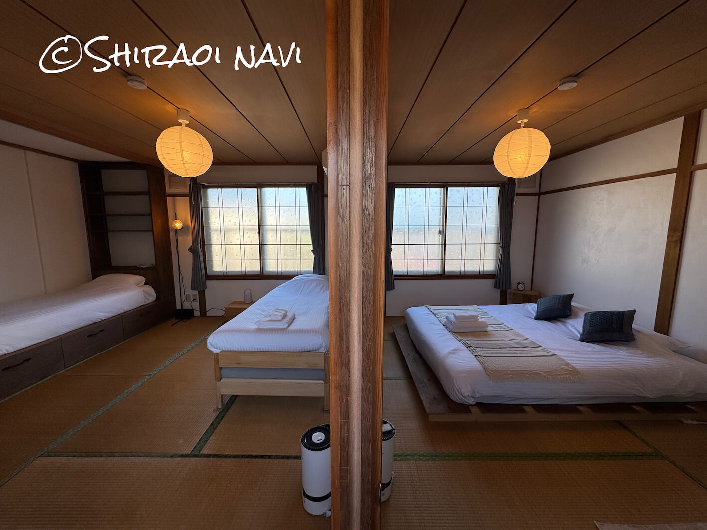 白老の貸別荘「Shiraoi Villa Auty」2階の和室。二間続きの広々とした空間にベッドが配置されており、グループ旅行やファミリー利用にもぴったり。和の雰囲気を活かしながら、現代的にリノベされた落ち着きのある客室。